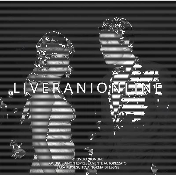 Claudia Cardinale alla Mostra del Cinema di Venezia nel 1965 - Retrospettiva nella foto con Warren Beatty ©ARCHIVIO / AGENZIA ALDO LIVERANI SAS