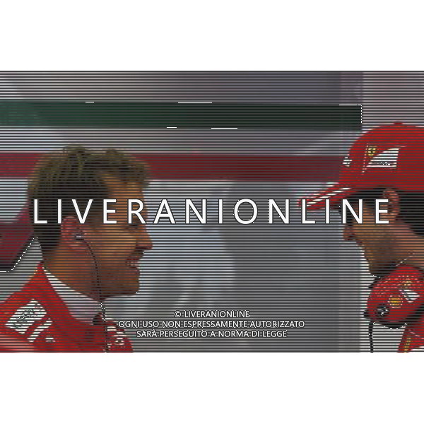 Sebastian Vettel (GER) Ferrari with Antonio Giovinazzi (ITA) Ferrari Development Driver. 15.04.2017. Formula 1 World Championship, Rd 3, Bahrain Grand Prix, Sakhir, Bahrain, Qualifying Day. ONLY ITALY AG ALDO LIVERANI SAS
