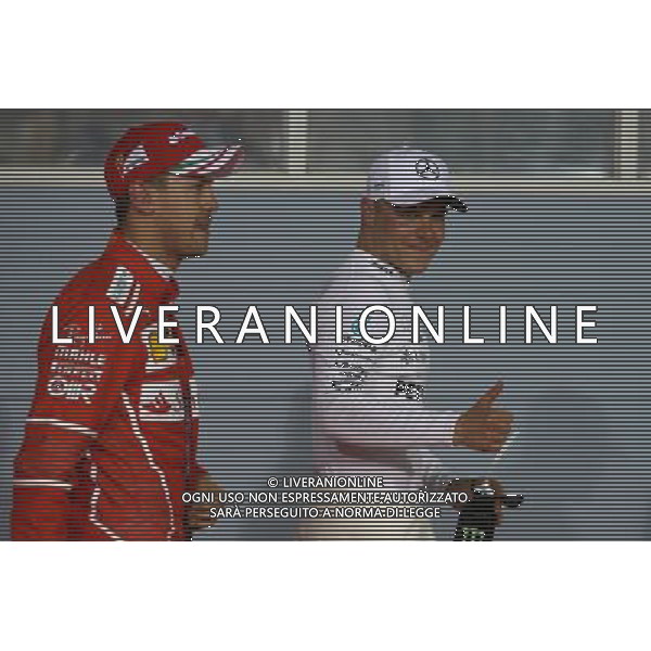 Sebastian Vettel (GER) Ferrari and Valtteri Bottas (FIN) Mercedes AMG F1 W08. 15.04.2017. Formula 1 World Championship, Rd 3, Bahrain Grand Prix, Sakhir, Bahrain, Qualifying Day. ONLY ITALY AG ALDO LIVERANI SAS
