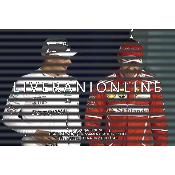Valtteri Bottas (FIN) Mercedes AMG F1 and Sebastian Vettel (GER) Scuderia Ferrari 15.04.2017. Formula 1 World Championship, Rd 3, Bahrain Grand Prix, Sakhir, Bahrain, Qualifying Day. ONLY ITALY AG ALDO LIVERANI SAS