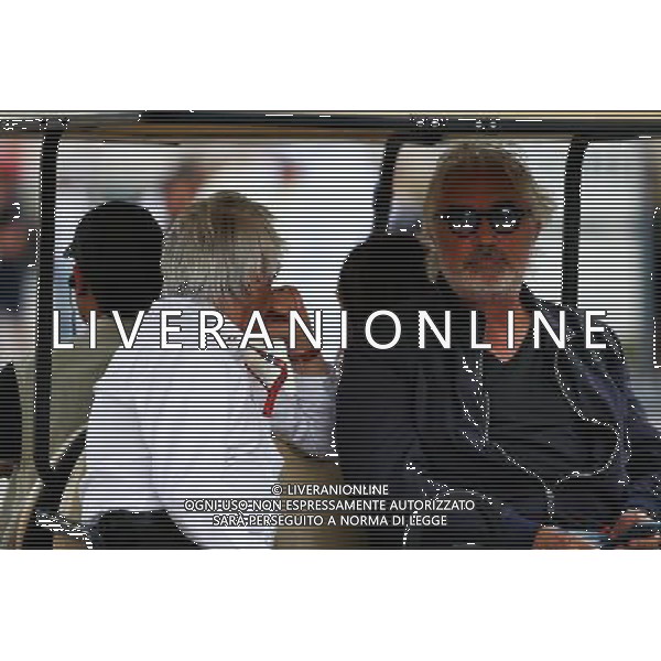 (L to R): Bernie Ecclestone (GBR) with Flavio Briatore (ITA). 15.04.2017. Formula 1 World Championship, Rd 3, Bahrain Grand Prix, Sakhir, Bahrain, Qualifying Day. ONLY ITALY AG ALDO LIVERANI SAS