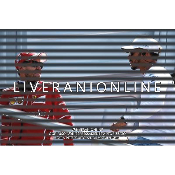 (L to R): Sebastian Vettel (GER) Ferrari and Lewis Hamilton (GBR) Mercedes AMG F1 on the drivers parade. 30.04.2017. Formula 1 World Championship, Rd 4, Russian Grand Prix, Sochi Autodrom, Sochi, Russia, Race Day. / AGENZIA ALDO LIVERANI SAS - ITALY ONLY EDITORIAL USE ONLY 