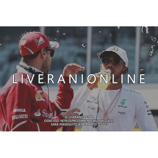 (L to R): Sebastian Vettel (GER) Ferrari and Lewis Hamilton (GBR) Mercedes AMG F1 on the drivers parade. 30.04.2017. Formula 1 World Championship, Rd 4, Russian Grand Prix, Sochi Autodrom, Sochi, Russia, Race Day. / AGENZIA ALDO LIVERANI SAS - ITALY ONLY EDITORIAL USE ONLY 