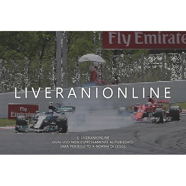 Valtteri Bottas (FIN) Mercedes AMG F1 W08 and Sebastian Vettel (GER) Ferrari SF70H battle for position. 14.05.2017. Formula 1 World Championship, Rd 5, Spanish Grand Prix, Barcelona, Spain, Race Day. / AGENZIA ALDO LIVERANI SAS - ITALY ONLY EDITORIAL USE ONLY - Gp F1 Spagna Gara Barcellona 14 maggio 2017 