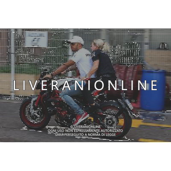 Lewis Hamilton (GBR) Mercedes AMG F1 on his MV Agusta Custom Dragster RR LH44 Superbike. 24.05.2017. Formula 1 World Championship, Rd 6, Monaco Grand Prix, Monte Carlo, Monaco, Preparation Day. AG ALDO LIVERANI SAS ONLY ITALY