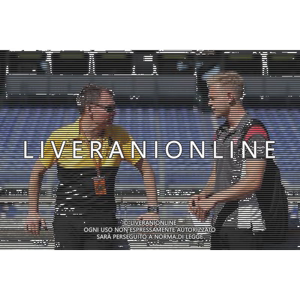 Alan Permane (GBR) Renault Sport F1 Team Trackside Operations Director and Kevin Magnussen (DEN) Haas F1 Team 24.05.2017. Formula 1 World Championship, Rd 6, Monaco Grand Prix, Monte Carlo, Monaco, Preparation Day. AG ALDO LIVERANI SAS ONLY ITALY