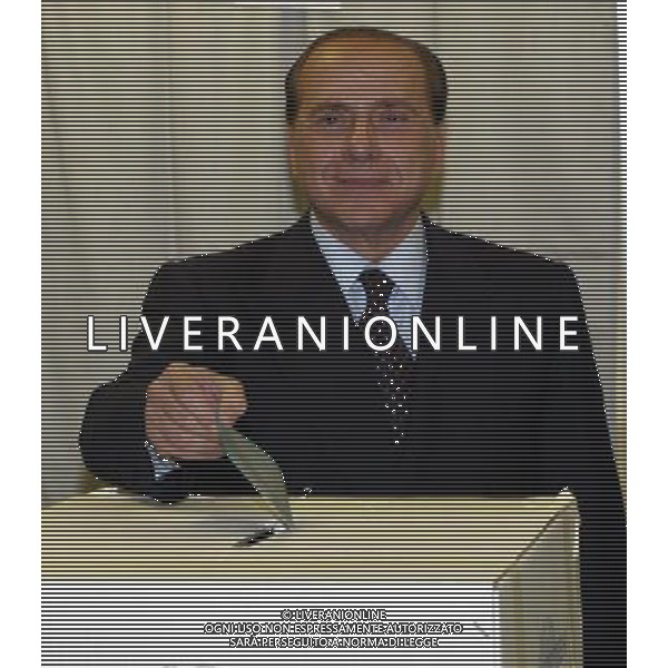Milano 3 Aprile 2005 Elezioni Regionali Lombardia 2005 nella foto: Berlusconi Silvio durante la votazione foto Andry / Ag. Aldo Liverani