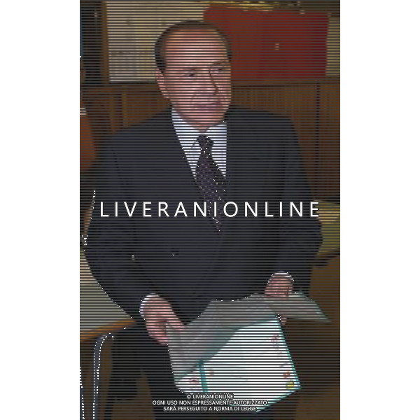 Milano 3 Aprile 2005 Elezioni Regionali Lombardia 2005 nella foto: Berlusconi Silvio durante la votazione foto Andry / Ag. Aldo Liverani