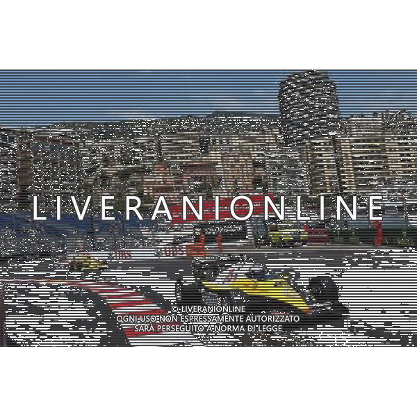 Alain Prost (FRA) Renault Sport F1 Team Special Advisor in the Renault RE40 leads Jean-Pierre Jabouille (FRA) in the Renault RS01. 26.05.2017. Formula 1 World Championship, Rd 6, Monaco Grand Prix, Monte Carlo, Monaco, Friday. AG ALDO LIVERANI SAS ONLY ITALY