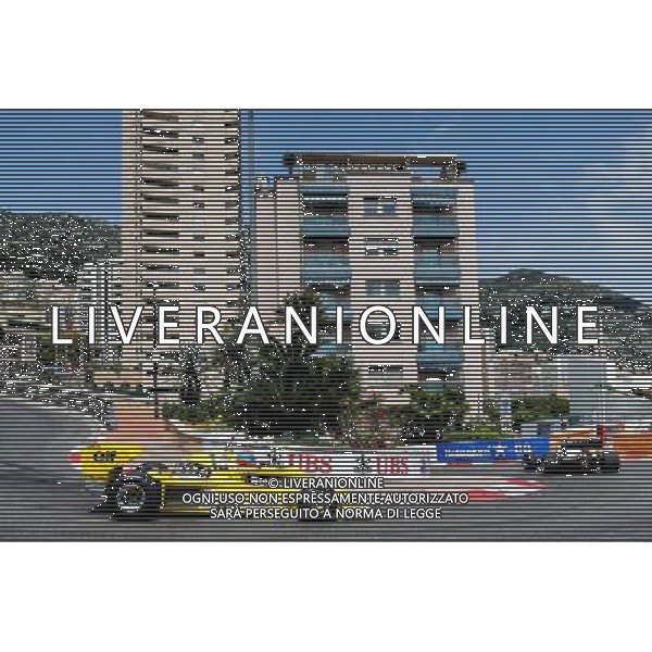 Alain Prost (FRA) Renault Sport F1 Team Special Advisor in the Renault RE40 leads Jean-Pierre Jabouille (FRA) in the Renault RS01. 26.05.2017. Formula 1 World Championship, Rd 6, Monaco Grand Prix, Monte Carlo, Monaco, Friday. AG ALDO LIVERANI SAS ONLY ITALY