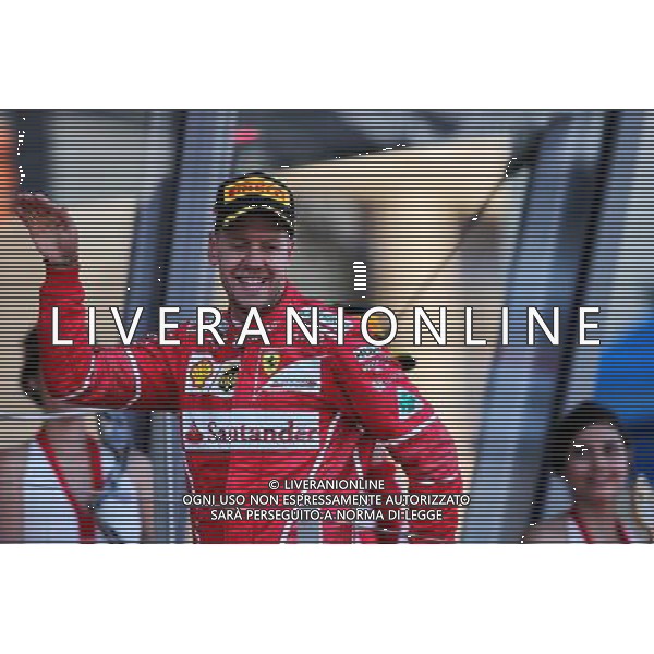 Race winner Sebastian Vettel (GER) Ferrari celebrates on the podium. 28.05.2017. Formula 1 World Championship, Rd 6, Monaco Grand Prix, Monte Carlo, Monaco, Race Day. AG ALDO LIVERANI SAS ONLY ITALY