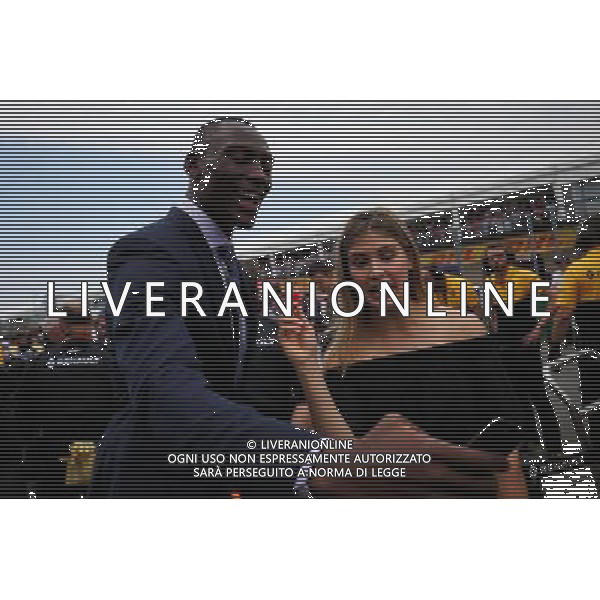 (L to R): Bismack Biyombo, NBA Basketball Player and Eugenie Bouchard (CDN) Tennis Player on the grid with the Renault Sport F1 Team. 11.06.2017. Formula 1 World Championship, Rd 7, Canadian Grand Prix, Montreal, Canada, Race Day. / AGENZIA ALDO LIVERANI SAS - ITALY ONLY EDITORIAL USE ONLY