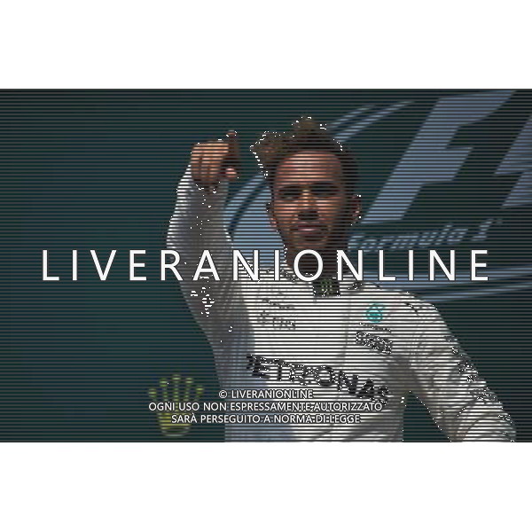Race winner Lewis Hamilton (GBR) Mercedes AMG F1 celebrates on the podium. 11.06.2017. Formula 1 World Championship, Rd 7, Canadian Grand Prix, Montreal, Canada, Race Day. / AGENZIA ALDO LIVERANI SAS - ITALY ONLY EDITORIAL USE ONLY
