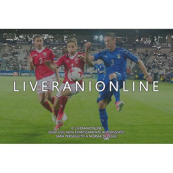 KRAKOW 18.06.2017 MECZ GRUPA C MISTRZOSTWA EUROPY U-21 W PILCE NOZNEJ 2017: DANIA - WLOCHY --- 2017 UEFA EUROPEAN U21 CHAMPIONSHIP MATCH: DENMARK - ITALY NZ ANTONIO BARRECA WOLCHY ITALY ANDREW HJULSAGER DANIA DENMARK MARCUS INGVARTSEN DANIA DENMARK FOT LUKASZ KRAJEWSKI / FOKUSMEDIA. / NEWSPIX.PL --- Newspix.pl AG ALDO LIVERANI SAS *** Local Caption *** www.newspix.pl mail us: info@newspix.pl call us: 0048 022 23 22 222 --- Polish Picture Agency by Ringier Axel Springer Poland