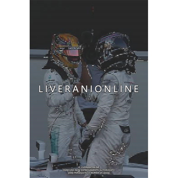 (L to R): Race winner Lewis Hamilton (GBR) Mercedes AMG F1 congratulates second placed Valtteri Bottas (FIN) Mercedes AMG F1 in parc ferme. 25.06.2017. Formula 1 World Championship, Rd 8, Azerbaijan Grand Prix, Baku Street Circuit, Azerbaijan, Race Day. / AGENZIA ALDO LIVERANI SAS ITALY ONLY - EDITORIAL USE ONLY - Gp F1 Baku Street Circuit, Azerbaijan, Gara 25.06.2017. 