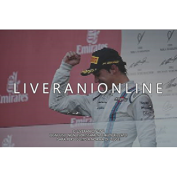 Lance Stroll (CDN) Williams celebrates his third position on the podium. 25.06.2017. Formula 1 World Championship, Rd 8, Azerbaijan Grand Prix, Baku Street Circuit, Azerbaijan, Race Day. / AGENZIA ALDO LIVERANI SAS ITALY ONLY - EDITORIAL USE ONLY - Gp F1 Baku Street Circuit, Azerbaijan, Gara 25.06.2017. 