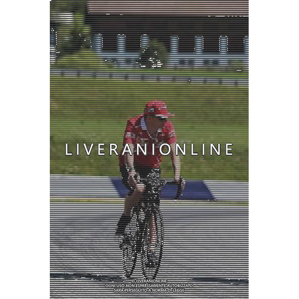 Kimi Raikkonen (FIN) Ferrari rides the circuit on a bicycle. 06.07.2017. Formula 1 World Championship, Rd 9, Austrian Grand Prix, Spielberg, Austria, Preparation Day. - www.xpbimages.com, EMail: requests@xpbimages.com - copy of publication required for printed pictures. Every used picture is fee-liable. Â© Copyright: Moy / XPB Images/Ag. Aldo Liverani s.a.s.