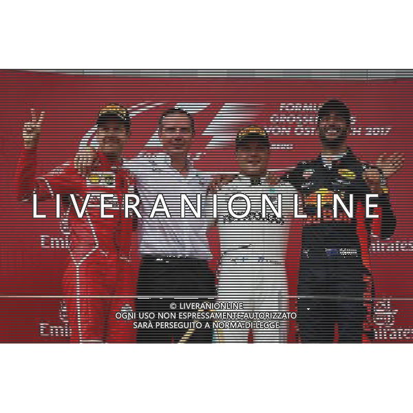The podium (L to R): Sebastian Vettel (GER) Ferrari, second; Valtteri Bottas (FIN) Mercedes AMG F1, race winner; Daniel Ricciardo (AUS) Red Bull Racing, third. 09.07.2017. Formula 1 World Championship, Rd 9, Austrian Grand Prix, Spielberg, Austria, Race Day. AG ALDO LIVERANI SAS ONLY ITALY