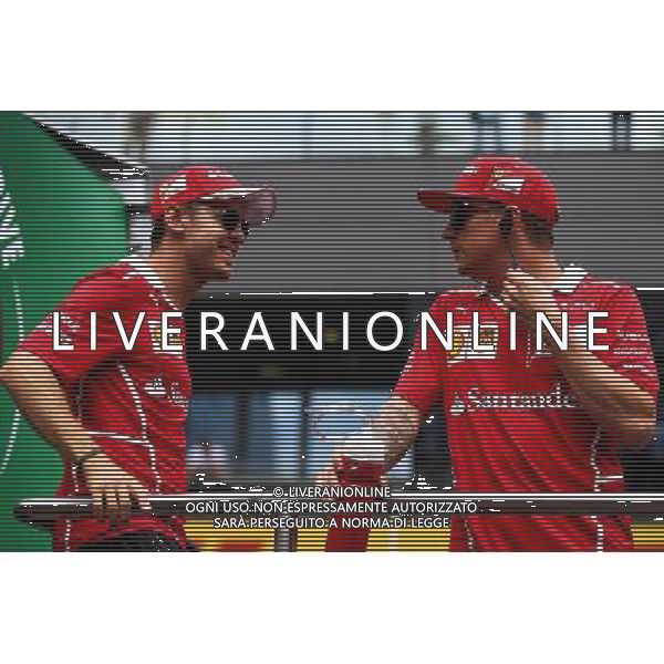 (L to R): Sebastian Vettel (GER) Ferrari with Kimi Raikkonen (FIN) Ferrari on the drivers parade. 09.07.2017. Formula 1 World Championship, Rd 9, Austrian Grand Prix, Spielberg, Austria, Race Day. AG ALDO LIVERANI SAS ONLY ITALY