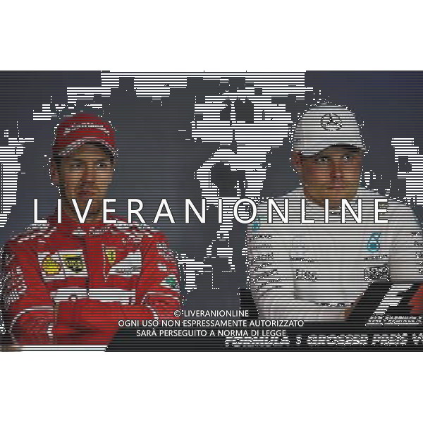 (L to R): Sebastian Vettel (GER) Ferrari with Valtteri Bottas (FIN) Mercedes AMG F1 in the FIA Press Conference. 09.07.2017. Formula 1 World Championship, Rd 9, Austrian Grand Prix, Spielberg, Austria, Race Day. AG ALDO LIVERANI SAS ONLY ITALY