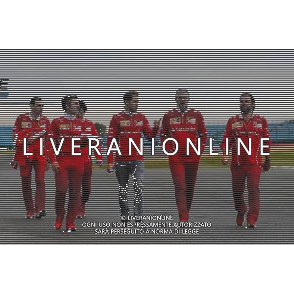 Sebastian Vettel (GER) Ferrari walks the circuit with the team with Maurizio Arrivabene (ITA) Ferrari Team Principal, Gino Rosato (CDN) Ferrari, and the team. 13.07.2017. Formula 1 World Championship, Rd 10, British Grand Prix, Silverstone, England, Preparation Day. AG ALDO LIVERANI SAS ONLY ITALY