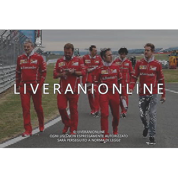 Sebastian Vettel (GER) Ferrari walks the circuit with the team with Maurizio Arrivabene (ITA) Ferrari Team Principal, Gino Rosato (CDN) Ferrari, and the team. 13.07.2017. Formula 1 World Championship, Rd 10, British Grand Prix, Silverstone, England, Preparation Day. AG ALDO LIVERANI SAS ONLY ITALY