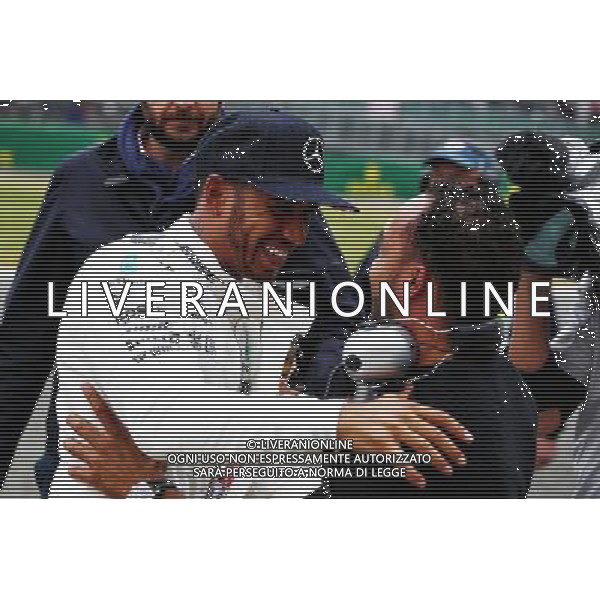 Lewis Hamilton (GBR) Mercedes AMG F1 celebrates his pole position with brother Nicolas Hamilton (GBR). 15.07.2017. Formula 1 World Championship, Rd 10, British Grand Prix, Silverstone, England, Qualifying Day. AG ALDO LIVERANI SAS ONLY ITALY