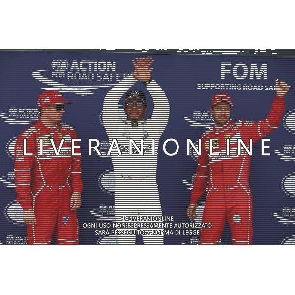 Qualifying top three in parc ferme (L to R): Kimi Raikkonen (FIN) Ferrari, second; Lewis Hamilton (GBR) Mercedes AMG F1, pole position; Sebastian Vettel (GER) Ferrari, third. 15.07.2017. Formula 1 World Championship, Rd 10, British Grand Prix, Silverstone, England, Qualifying Day. AG ALDO LIVERANI SAS ONLY ITALY