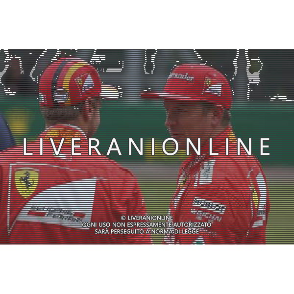 Sebastian Vettel (GER) Ferrari SF70H and Kimi Raikkonen (FIN) Ferrari SF70H. 15.07.2017. Formula 1 World Championship, Rd 10, British Grand Prix, Silverstone, England, Qualifying Day. AG ALDO LIVERANI SAS ONLY ITALY