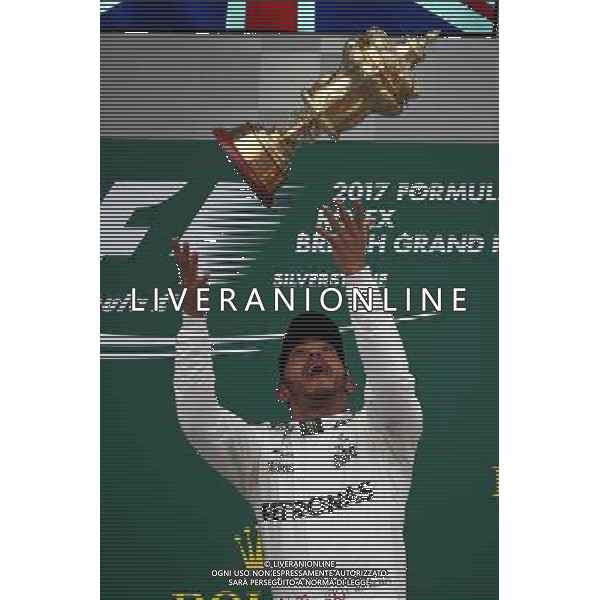 1st place Lewis Hamilton (GBR) Mercedes AMG F1 W08, 2nd place Valtteri Bottas (FIN) Mercedes AMG F1 W08 and 3rd place Kimi Raikkonen (FIN) Ferrari SF70H. 16.07.2017. Formula 1 World Championship, Rd 10, British Grand Prix, Silverstone, England, Race Day. AG ALDO LIVERAI SAS ONLY ITALY
