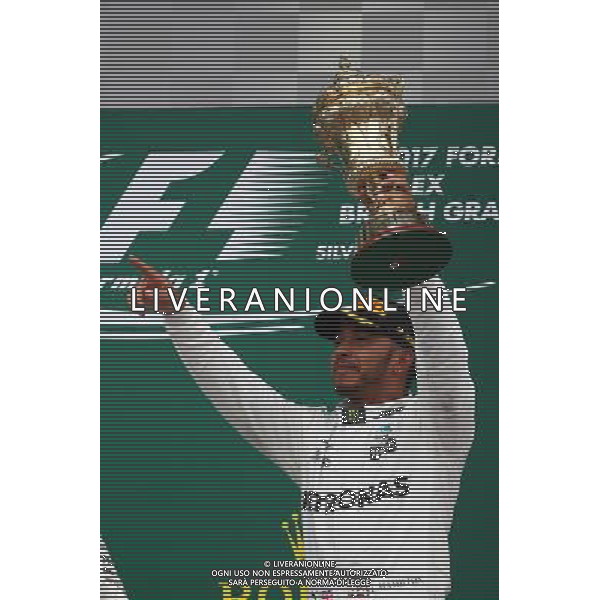 1st place Lewis Hamilton (GBR) Mercedes AMG F1 W08, 2nd place Valtteri Bottas (FIN) Mercedes AMG F1 W08 and 3rd place Kimi Raikkonen (FIN) Ferrari SF70H. 16.07.2017. Formula 1 World Championship, Rd 10, British Grand Prix, Silverstone, England, Race Day. AG ALDO LIVERAI SAS ONLY ITALY