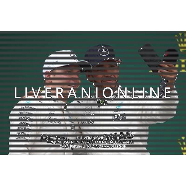 2nd place Valtteri Bottas (FIN) Mercedes AMG F1 W08 and 1st place Lewis Hamilton (GBR) Mercedes AMG F1 W08. 16.07.2017. Formula 1 World Championship, Rd 10, British Grand Prix, Silverstone, England, Race Day. AG ALDO LIVERANI SAS ONLY ITALY