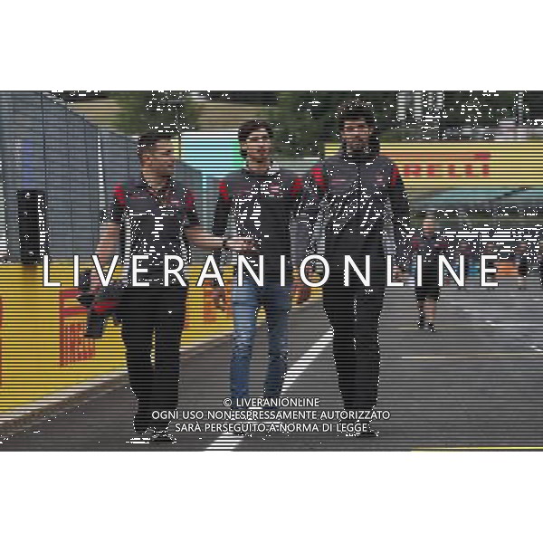 Antonio Giovinazzi (ITA) Haas F1 Team Test Driver (Centre) walks the circuit. 27.07.2017. Formula 1 World Championship, Rd 11, Hungarian Grand Prix, Budapest, Hungary, Preparation Day. / AGENZIA ALDO LIVERANI SAS - ITALY ONLY EDITORIAL USE ONLY