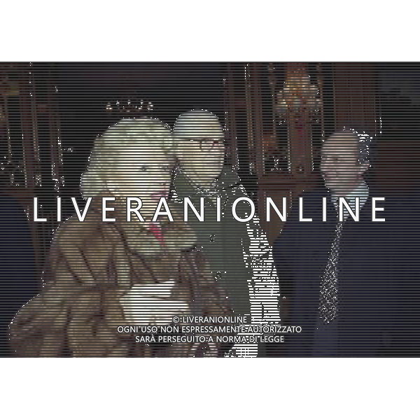 16-12-1997 MILANO HOTEL PRINCIPE E SAVOIA FESTA DI NATALE DELLA LEGA CALCIO NELLA FOTO LADY RENATA FRAIZZOLI CON IVANOE FRAIZZOLI E IL MEDICO COLOMBO AG ALDO LIVERANI SAS