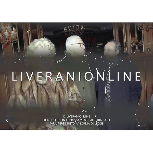 16-12-1997 MILANO HOTEL PRINCIPE E SAVOIA FESTA DI NATALE DELLA LEGA CALCIO NELLA FOTO LADY RENATA FRAIZZOLI CON IVANOE FRAIZZOLI E IL MEDICO COLOMBO AG ALDO LIVERANI SAS