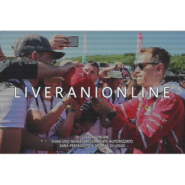 Sebastian Vettel (GER) Ferrari signs autographs for the fans. 29.07.2017. Formula 1 World Championship, Rd 11, Hungarian Grand Prix, Budapest, Hungary, Qualifying Day. /AGENZIA ALDO LIVERANI SAS - ITALY ONLY - EDITORIAL USE ONLY - GP F1 UNGHERIA PROVE UFFICIALI QUALIFICHE 29/07/2017