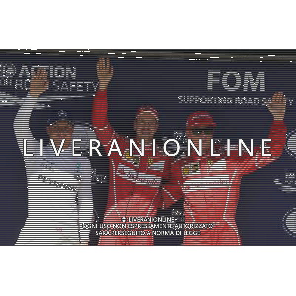 Qualifying top three in parc ferme (L to R): Valtteri Bottas (FIN) Mercedes AMG F1, third, Sebastian Vettel (GER) Ferrari; pole position; Kimi Raikkonen (FIN) Ferrari, second. 29.07.2017. Formula 1 World Championship, Rd 11, Hungarian Grand Prix, Budapest, Hungary, Qualifying Day. /AGENZIA ALDO LIVERANI SAS - ITALY ONLY - EDITORIAL USE ONLY - - GP F1 UNGHERIA PROVE UFFICIALI QUALIFICHE 29/07/2017