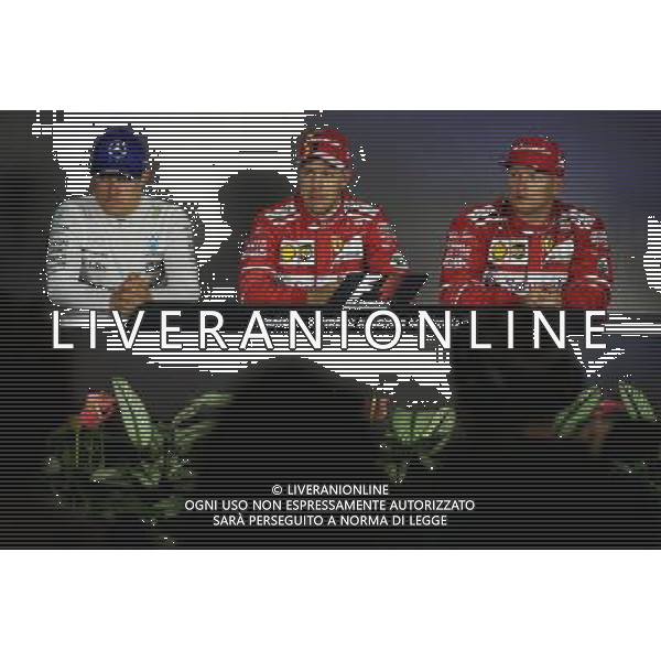 Qualifying top three in the FIA Press Conference (L to R): Valtteri Bottas (FIN) Mercedes AMG F1, third, Sebastian Vettel (GER) Ferrari; pole position; Kimi Raikkonen (FIN) Ferrari, second. 29.07.2017. Formula 1 World Championship, Rd 11, Hungarian Grand Prix, Budapest, Hungary, Qualifying Day. /AGENZIA ALDO LIVERANI SAS - ITALY ONLY - EDITORIAL USE ONLY - - GP F1 UNGHERIA PROVE UFFICIALI QUALIFICHE 29/07/2017