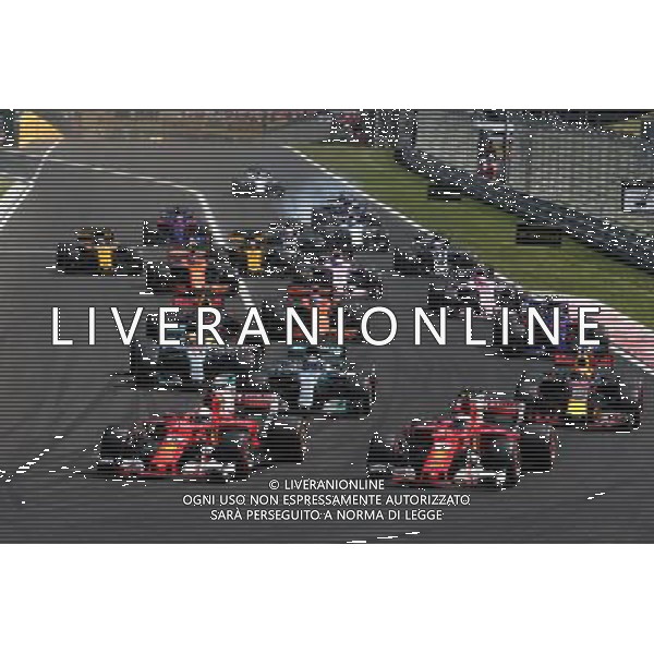 (L to R): Sebastian Vettel (GER) Ferrari SF70H and Kimi Raikkonen (FIN) Ferrari SF70H lead at the start of the race. 30.07.2017. Formula 1 World Championship, Rd 11, Hungarian Grand Prix, Budapest, Hungary, Race Day. /AGENZIA ALDO LIVERANI SAS - ITALY ONLY - EDITORIAL USE ONLY - - GP F1 BUDAPEST UNGHERIA GARA 30/07/2017