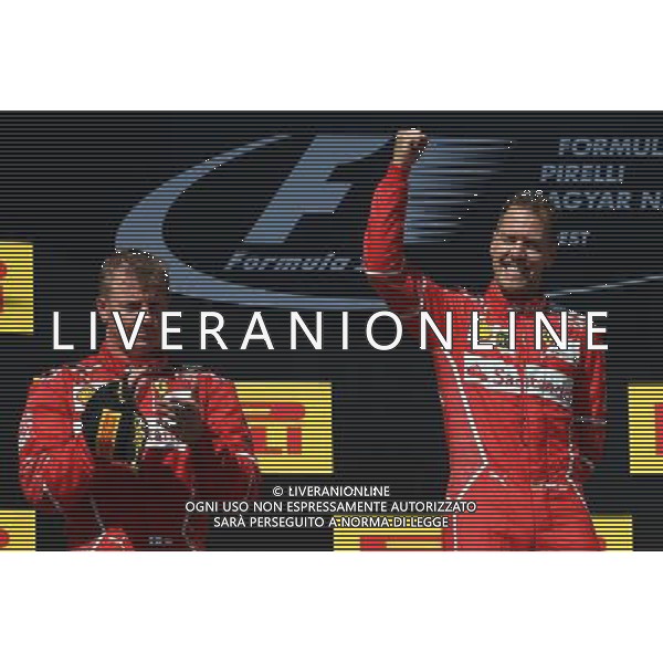 1st place Sebastian Vettel (GER) Ferrari SF70H, 2nd place Kimi Raikkonen (FIN) Ferrari SF70H and 3rd place. 30.07.2017. Formula 1 World Championship, Rd 11, Hungarian Grand Prix, Budapest, Hungary, Race Day. /AGENZIA ALDO LIVERANI SAS - ITALY ONLY - EDITORIAL USE ONLY - - GP F1 BUDAPEST UNGHERIA GARA 30/07/2017