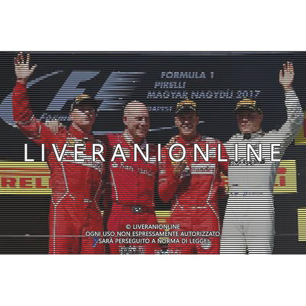 The podium (L to R): Kimi Raikkonen (FIN) Ferrari, second; Jock Clear (GBR) Ferrari Engineering Director; Sebastian Vettel (GER) Ferrari, race winner; Valtteri Bottas (FIN) Mercedes AMG F1, third. 30.07.2017. Formula 1 World Championship, Rd 11, Hungarian Grand Prix, Budapest, Hungary, Race Day. /AGENZIA ALDO LIVERANI SAS - ITALY ONLY - EDITORIAL USE ONLY - - GP F1 BUDAPEST UNGHERIA GARA 30/07/2017