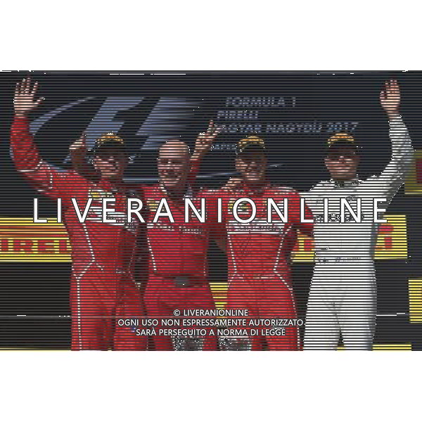 The podium (L to R): Kimi Raikkonen (FIN) Ferrari, second; Jock Clear (GBR) Ferrari Engineering Director; Sebastian Vettel (GER) Ferrari, race winner; Valtteri Bottas (FIN) Mercedes AMG F1, third. 30.07.2017. Formula 1 World Championship, Rd 11, Hungarian Grand Prix, Budapest, Hungary, Race Day. /AGENZIA ALDO LIVERANI SAS - ITALY ONLY - EDITORIAL USE ONLY - - GP F1 BUDAPEST UNGHERIA GARA 30/07/2017