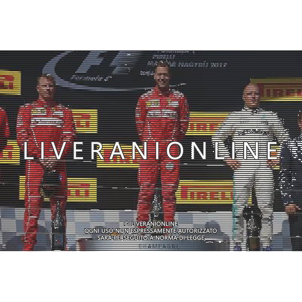 1st place Sebastian Vettel (GER) Ferrari SF70H, 2nd place Kimi Raikkonen (FIN) Ferrari SF70H and 3rd place Valtteri Bottas (FIN) Mercedes AMG F1 W08. 30.07.2017. Formula 1 World Championship, Rd 11, Hungarian Grand Prix, Budapest, Hungary, Race Day. /AGENZIA ALDO LIVERANI SAS - ITALY ONLY - EDITORIAL USE ONLY - - GP F1 BUDAPEST UNGHERIA GARA 30/07/2017