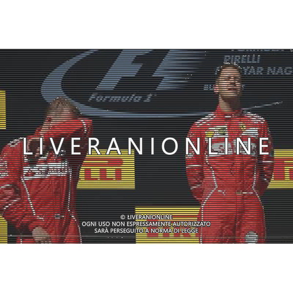 1st place Sebastian Vettel (GER) Ferrari SF70H, 2nd place Kimi Raikkonen (FIN) Ferrari SF70H and 3rd place. 30.07.2017. Formula 1 World Championship, Rd 11, Hungarian Grand Prix, Budapest, Hungary, Race Day. /AGENZIA ALDO LIVERANI SAS - ITALY ONLY - EDITORIAL USE ONLY - - GP F1 BUDAPEST UNGHERIA GARA 30/07/2017