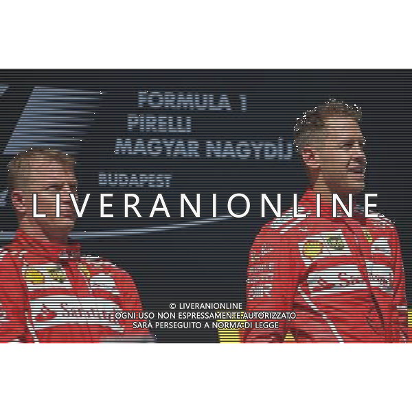 Sebastian Vettel (GER) Scuderia Ferrari and Kimi Raikkonen (FIN) Scuderia Ferrari 30.07.2017. Formula 1 World Championship, Rd 11, Hungarian Grand Prix, Budapest, Hungary, Race Day. /AGENZIA ALDO LIVERANI SAS - ITALY ONLY - EDITORIAL USE ONLY - - GP F1 BUDAPEST UNGHERIA GARA 30/07/2017
