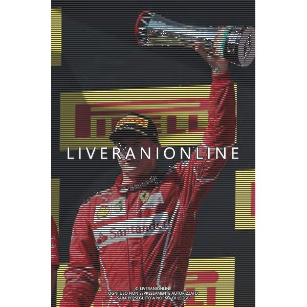 Kimi Raikkonen (FIN) Ferrari celebrates his second position on the podium. 30.07.2017. Formula 1 World Championship, Rd 11, Hungarian Grand Prix, Budapest, Hungary, Race Day. /AGENZIA ALDO LIVERANI SAS - ITALY ONLY - EDITORIAL USE ONLY - - GP F1 BUDAPEST UNGHERIA GARA 30/07/2017