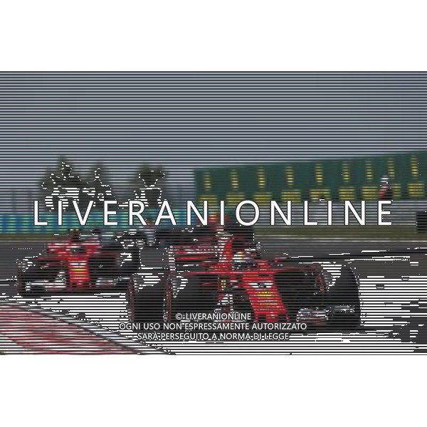 Sebastian Vettel (GER) Ferrari SF70H leads team mate Kimi Raikkonen (FIN) Ferrari SF70H. 30.07.2017. Formula 1 World Championship, Rd 11, Hungarian Grand Prix, Budapest, Hungary, Race Day. /AGENZIA ALDO LIVERANI SAS - ITALY ONLY - EDITORIAL USE ONLY - - GP F1 BUDAPEST UNGHERIA GARA 30/07/2017