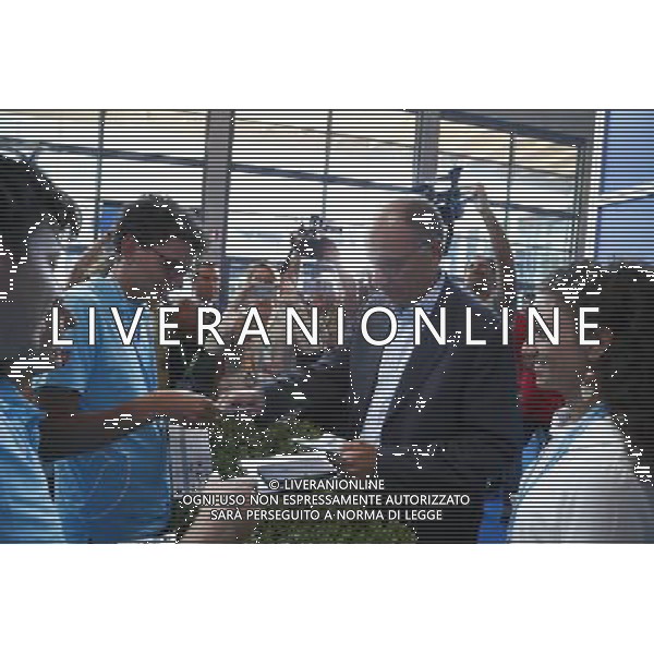 Rimini - XXXVIII Edizione Meeting per l\'Amicizia fra i Popoli 21/08/2017 nella foto: Enrico Letta compra un biglietto della lotteria ©Claudio Zamagni/Agenzia Aldo Liverani 