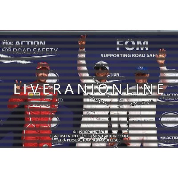 Qualifying top three in parc ferme (L to R): Sebastian Vettel (GER) Ferrari, second; Lewis Hamilton (GBR) Mercedes AMG F1, pole position; Valtteri Bottas (FIN) Mercedes AMG F1, third. 26.08.2017. Formula 1 World Championship, Rd 12, Belgian Grand Prix, Spa Francorchamps, Belgium, Qualifying Day. AG ALDO LIVERANI SAS ONLY ITALY