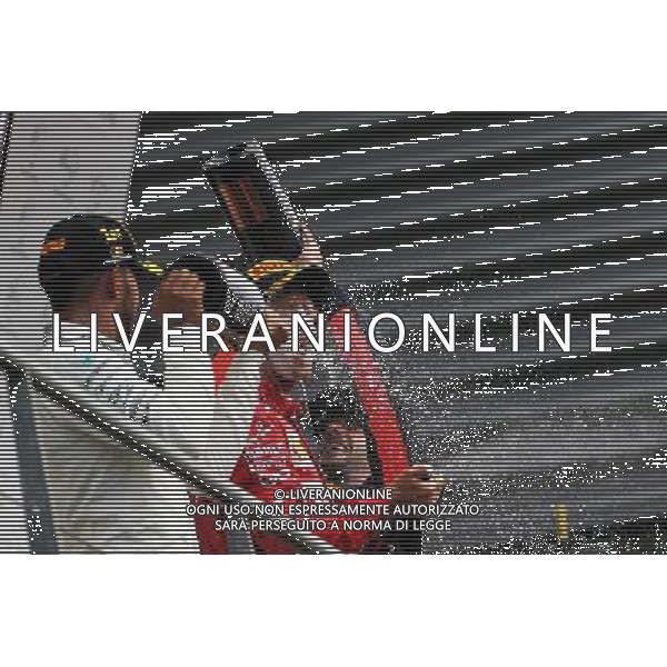 Race winner Lewis Hamilton (GBR) Mercedes AMG F1 celebrates with second placed Sebastian Vettel (GER) Ferrari on the podium. 27.08.2017. Formula 1 World Championship, Rd 12, Belgian Grand Prix, Spa Francorchamps, Belgium, Race Day. / AGENZIA ALDO LIVERANI SAS - ITALY ONLY EDITORIAL USE ONLY